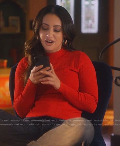 Ana’s red ribbed mock neck sweater on Grown-ish