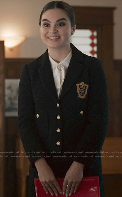 Bella’s black jacket with gold buttons on The Republic of Sarah