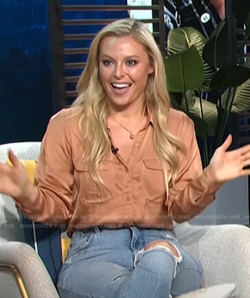 Cristy Lee’s brown satin blouse on E! News Daily Pop