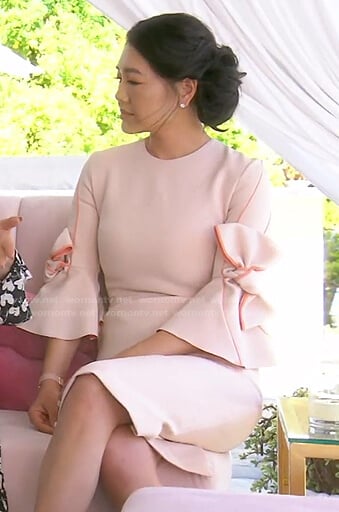 Crystal’s pink bow sleeve sheath dress on The Real Housewives of Beverly Hills