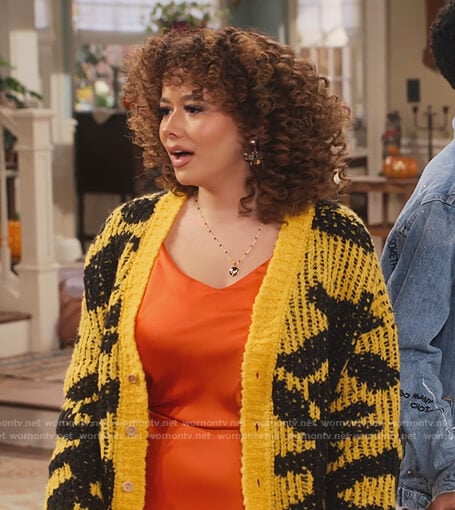 Jade’s yellow knit cardigan on Family Reunion