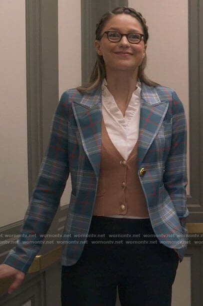 Kara’s blue plaid blazer and camel sweater on Supergirl