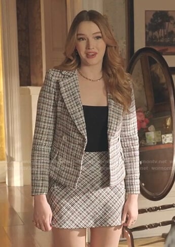 Kirby’s white plaid blazer and mini skirt on Dynasty