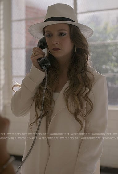 Liv’s white trench coat and hat on American Horror Stories