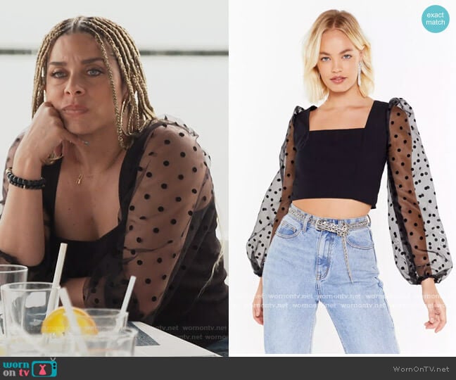 Nasty Gal Sheer Polka Dot Sleeve Crop Top worn by Robyn Dixon on The Real Housewives of Potomac