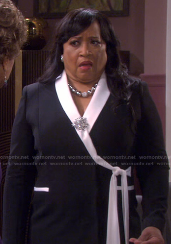 Paulina’s black contrast lapel wrap dress on Days of our Lives