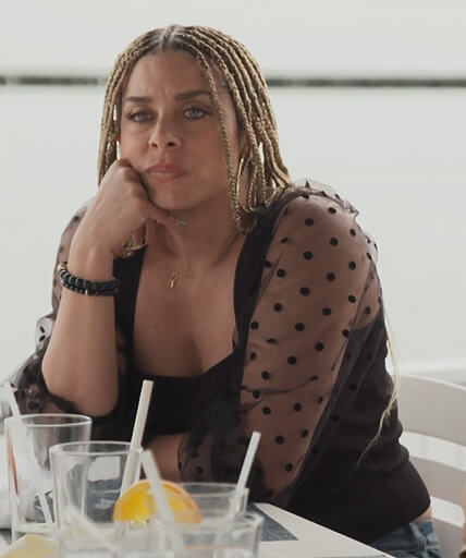 Robyn’s black sheer polka dot blouse on The Real Housewives of Potomac