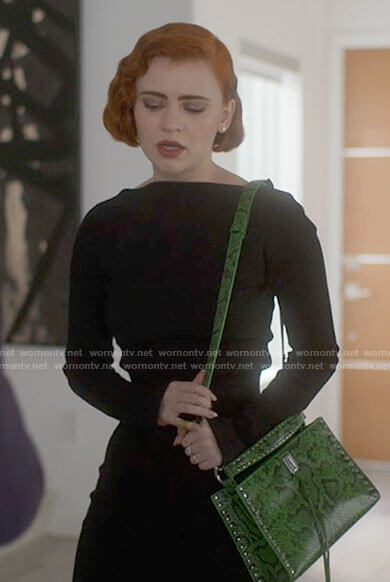 Scarlett’s green snake print bag on American Horror Stories