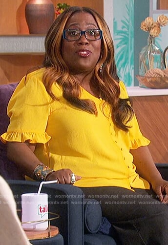 Sheryl’s yellow ruffle sleeve blouse on The Talk