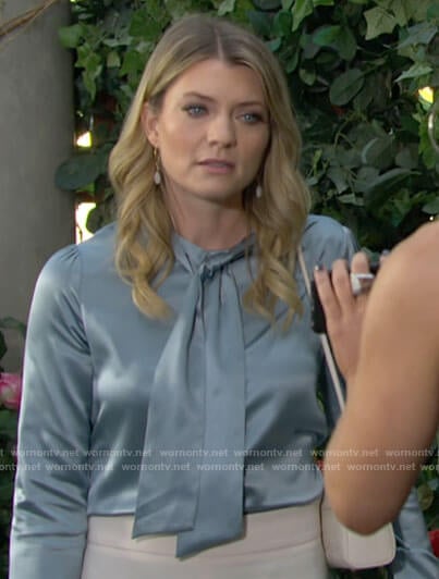 Tara’s blue tie neck blouse on The Young and the Restless