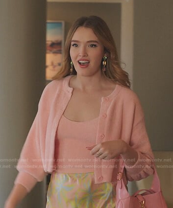 Kirby’s pink cropped cardigan and palm tree print skirt on Dynasty