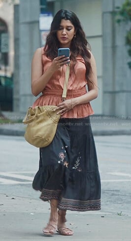 Leela’s orange tie neck peplum top and embroidered skirt on The Resident