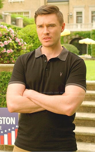 Adam’s black polo shirt on Dynasty