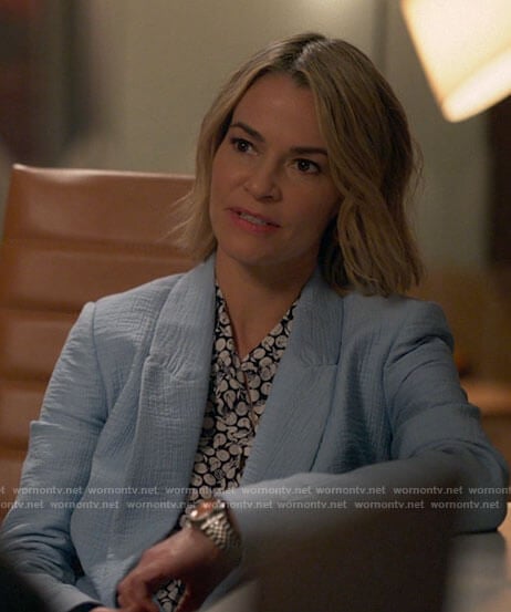 Alice’s light blue blazer and  orange print top and pants on The L Word Generation Q