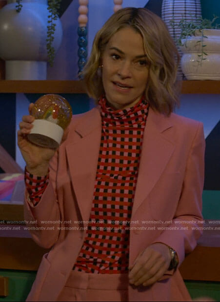 Alice’s pink suit and checked turtleneck on The L Word Generation Q