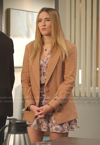 Amanda’s floral mini dress and orange check blazer on Dynasty