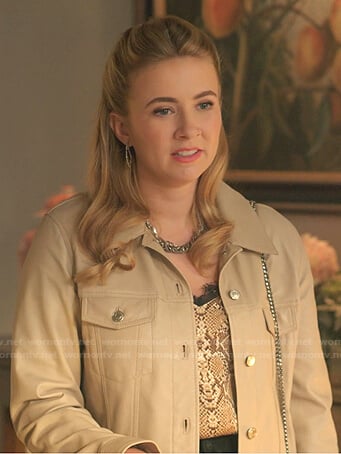 Amanda’s snake print top and beige jacket on Dynasty