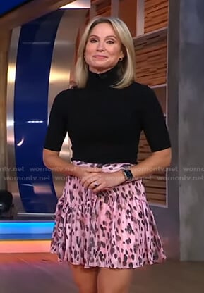 Amy’s black button detail sweater and pink leopard skirt on Good Morning America
