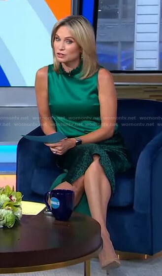 Amy’s green ruffle neck top and leopard print skirt on Good Morning America