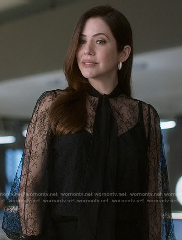 Andrea’s black lace tie-neck blouse on Supergirl