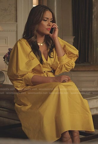 Cristal’s yellow puff sleeve midi dress on Dynasty