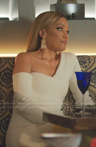 Dominique’s white one off-shoulder dress on Dynasty