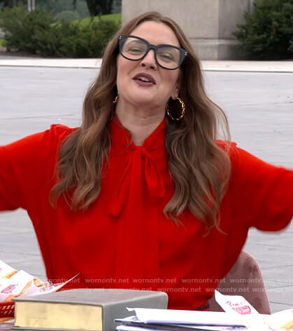 Drew’s red tie neck blouse on The Drew Barrymore Show