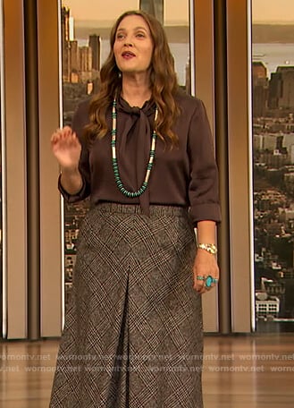 Drew’s brown tie neck silk blouse on The Drew Barrymore Show