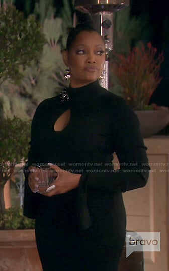 Garcelle’s black chain detail cutout dress on The Real Housewives of Beverly Hills