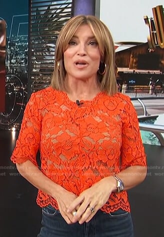 Kit’s red floral lace top on Access Hollywood