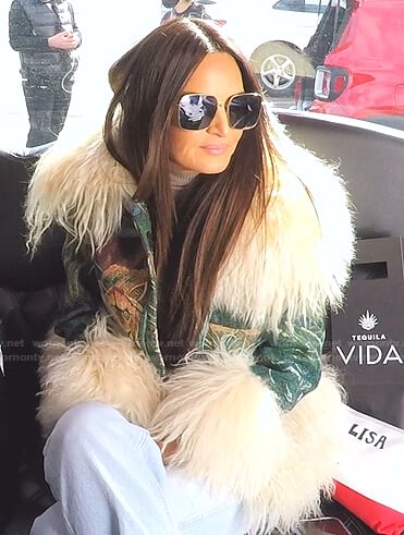 Lisa’s green animal embroidered fur trim jacket on The Real Housewives of Salt Lake City