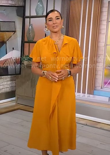 Michelle Miller’s orange ruffled midi dress on CBS Mornings