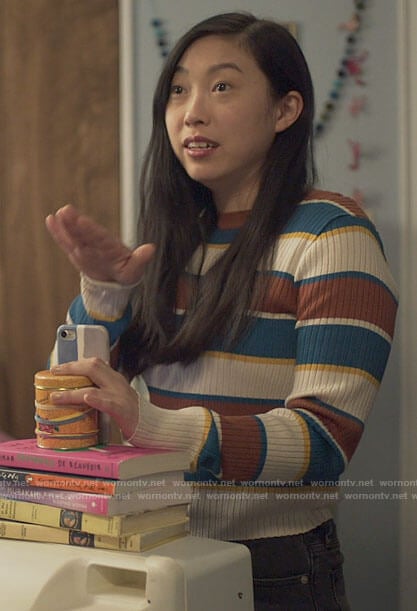 Nora’s striped sweater on Awkwafina is Nora From Queens