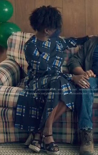 Nova’s plaid dress and sandals on Queen Sugar