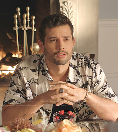 Sam’s white printed zip front shirt on Dynasty