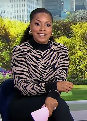 Sheinelle’s zebra sweater and chain ankle strap pumps on Today