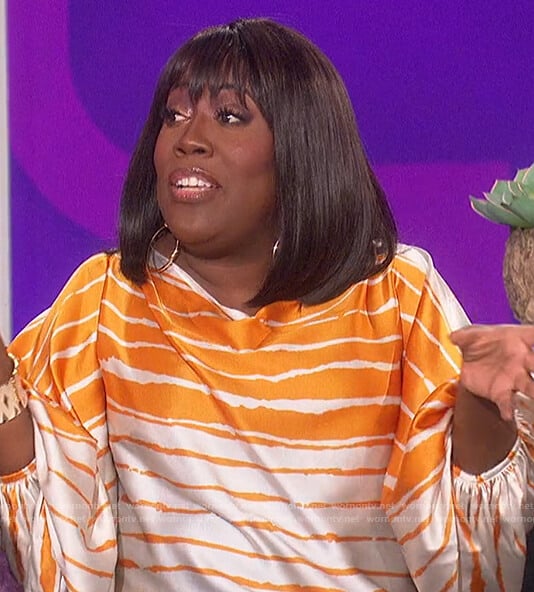 Sheryl’s orange stripe blouse on The Talk