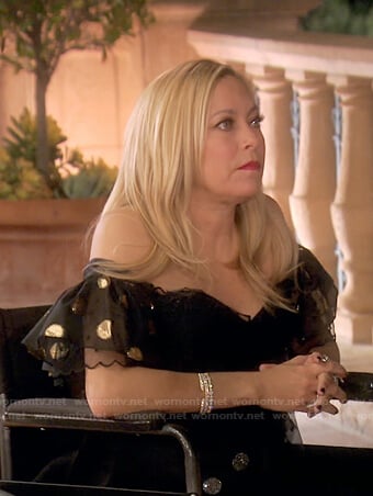 Sutton’s black metallic polka dot ruffle dress on The Real Housewives of Beverly Hills