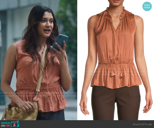 T Tahari Ruffle Tie-Neck Peplum Top worn by Leela Devi (Anuja Joshi) on The Resident