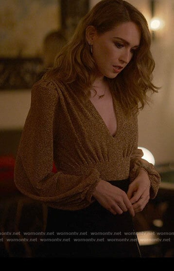 Tess’s metallic gold v-neck long sleeve bodysuit on The L Word Generation Q