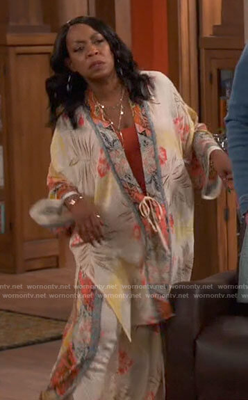 Tina’s tropical floral kimono and pants set on The Neighborhood