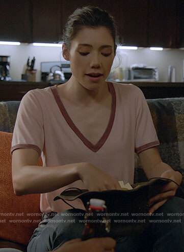 Violet’s pink t-shirt with red trim on Chicago Fire