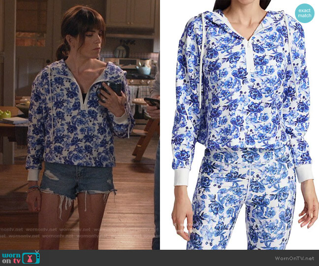 Alice + Olivia Quinlan Half Zip Hoodie worn by Marina (Karla Souza) on Home Economics