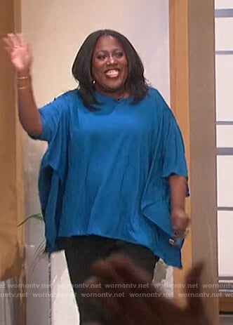 Sheryl’s blue cape top on The Talk