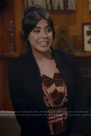Adriana’s printed peplum top on B Positive
