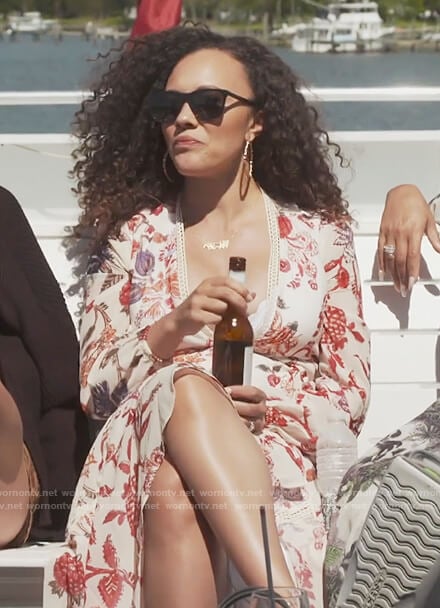 Ashley’s white floral print dress on The Real Housewives of Potomac