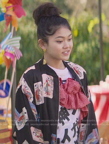 Claudia’s black Japanese card print bomber jacket on The Baby-Sitters Club