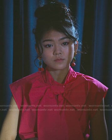 Claudia’s pink tie neck top  on The Baby-Sitters Club