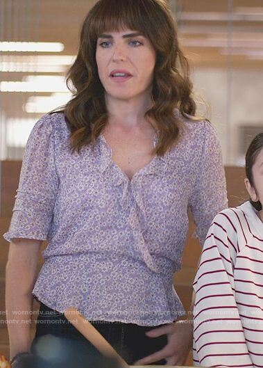 Marina’s purple floral ruffle top on Home Economics