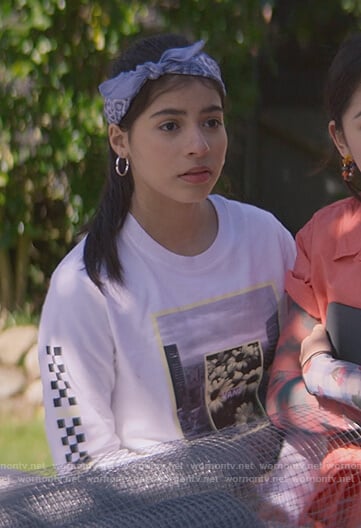 Dawn’s white graphic long sleeve tee on The Baby-Sitters Club